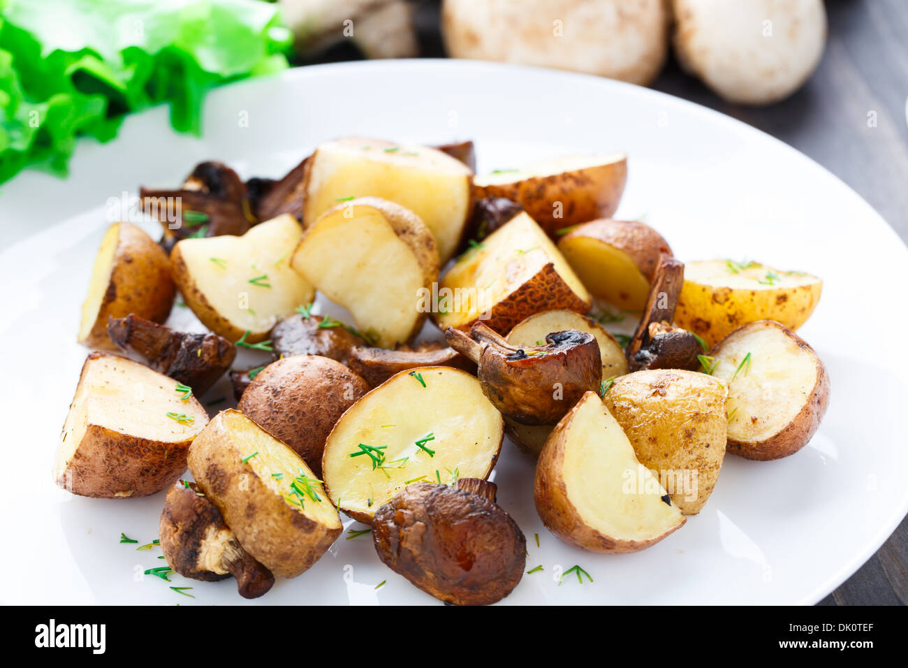 Roasted potato and mushrooms Stock Photo Alamy