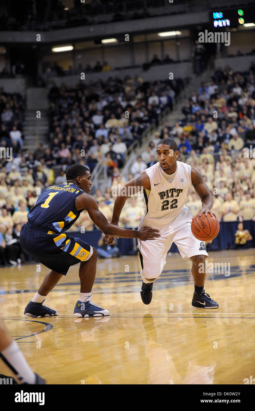 Jan. 8, 2011 - Pittsburgh, PENNSYLVANNIA, U.S - Pittsburgh Panthers guard Brad Wanamaker (22) moves the ball down court in the first half as Marquette Golden Eagles guard Darius Johnson-Odom (1) defends as PITT takes on Marquette in Big East conference play at the Petersen Events Center in Pittsburgh, PA. (Credit Image: © Dean Beattie/Southcreek Global/ZUMAPRESS.com) Stock Photo