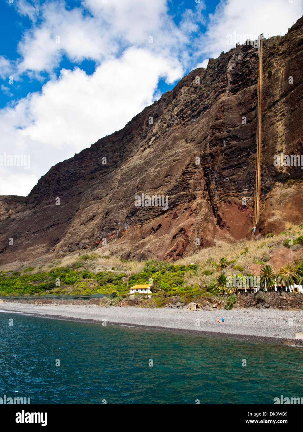 Fajã dos Padres beach and cliffs with the elevator to go down in the right  side Stock Photo - Alamy