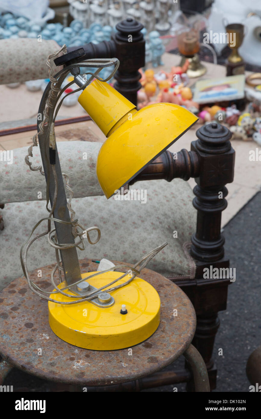 Bright yellow desk lamp on sale at the Porta Portese flea market in Rome, Lazio, Italy Stock Photo