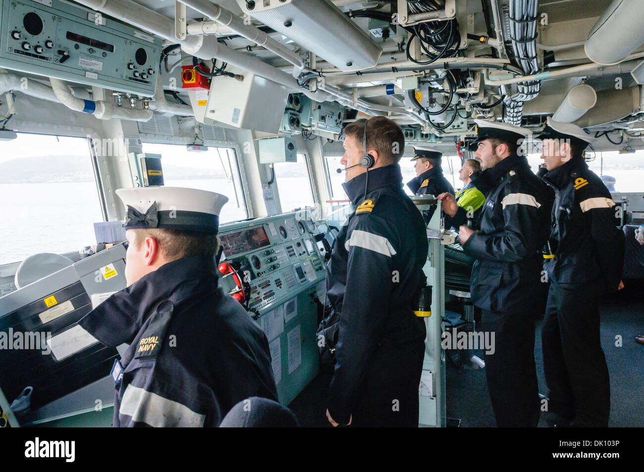 Belfast, Northern Ireland. 30th Nov 2013 - Officers on board the bridge of HMS Monmouth, a Royal Navy type 23 Frigate, as it pulls into port. Credit:  Stephen Barnes/Alamy Live News Stock Photo
