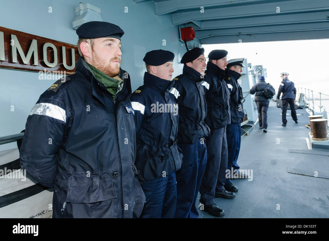 Belfast, Northern Ireland. 30th Nov 2013 - Sailors on HMS Monmouth, a Royal Navy type 23 Frigate, line up as the ship is about to berth. Credit:  Stephen Barnes/Alamy Live News Stock Photo