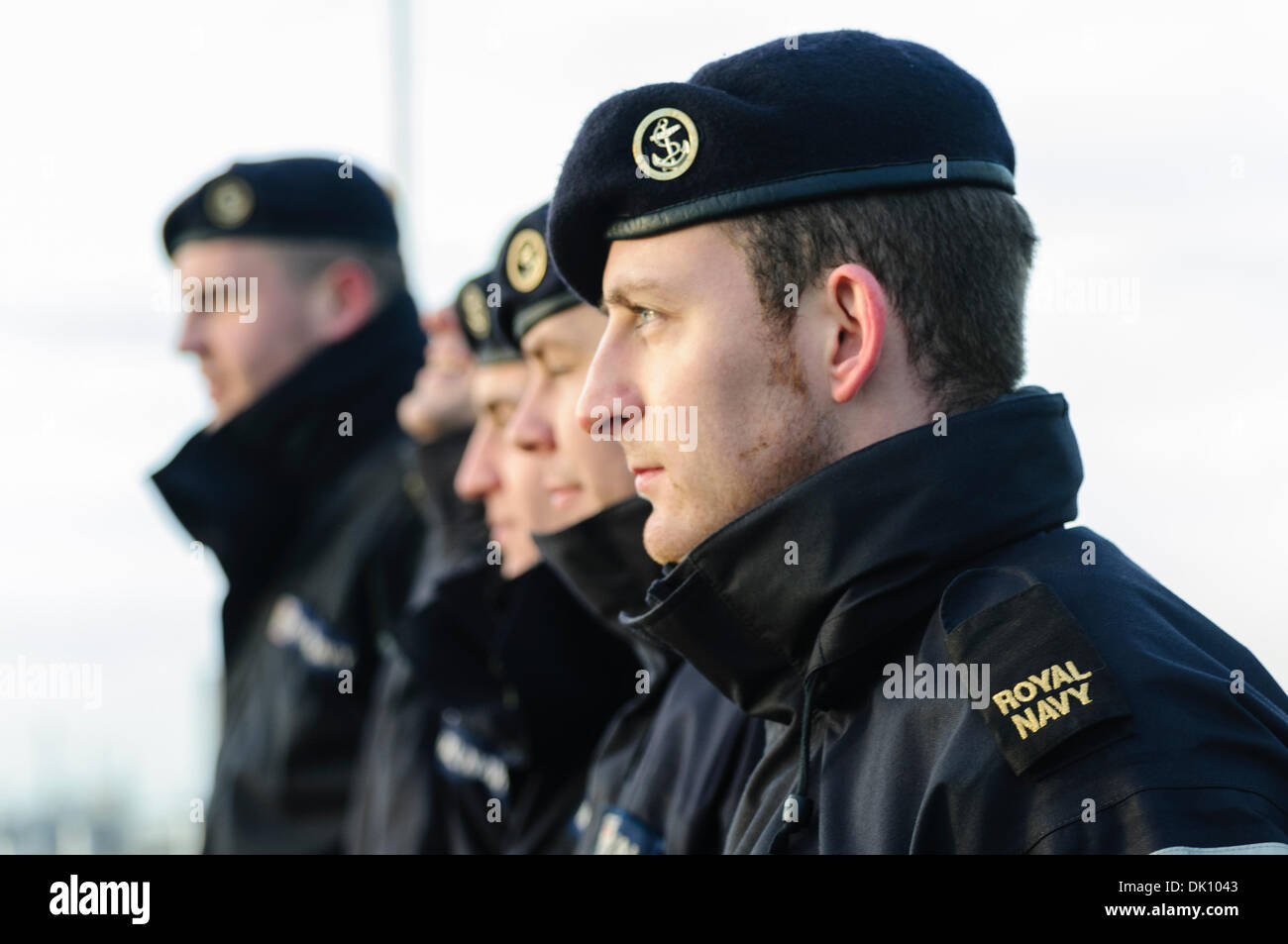 Belfast, Northern Ireland. 30th Nov 2013 - Sailors on HMS Monmouth, a Royal Navy type 23 Frigate, line up as the ship is about to berth. Credit:  Stephen Barnes/Alamy Live News Stock Photo