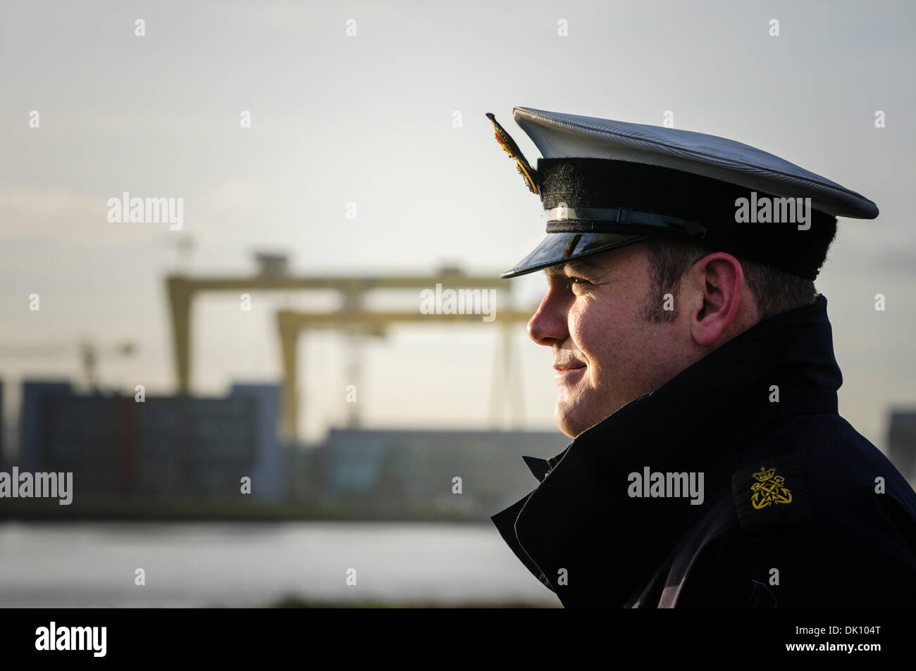 Belfast, Northern Ireland. 30th Nov 2013 - Commander Ruddock of HMS Monmouth, a Royal Navy type 23 Frigate looks out over the Harland And Wolff cranes in Belfast. Credit:  Stephen Barnes/Alamy Live News Stock Photo