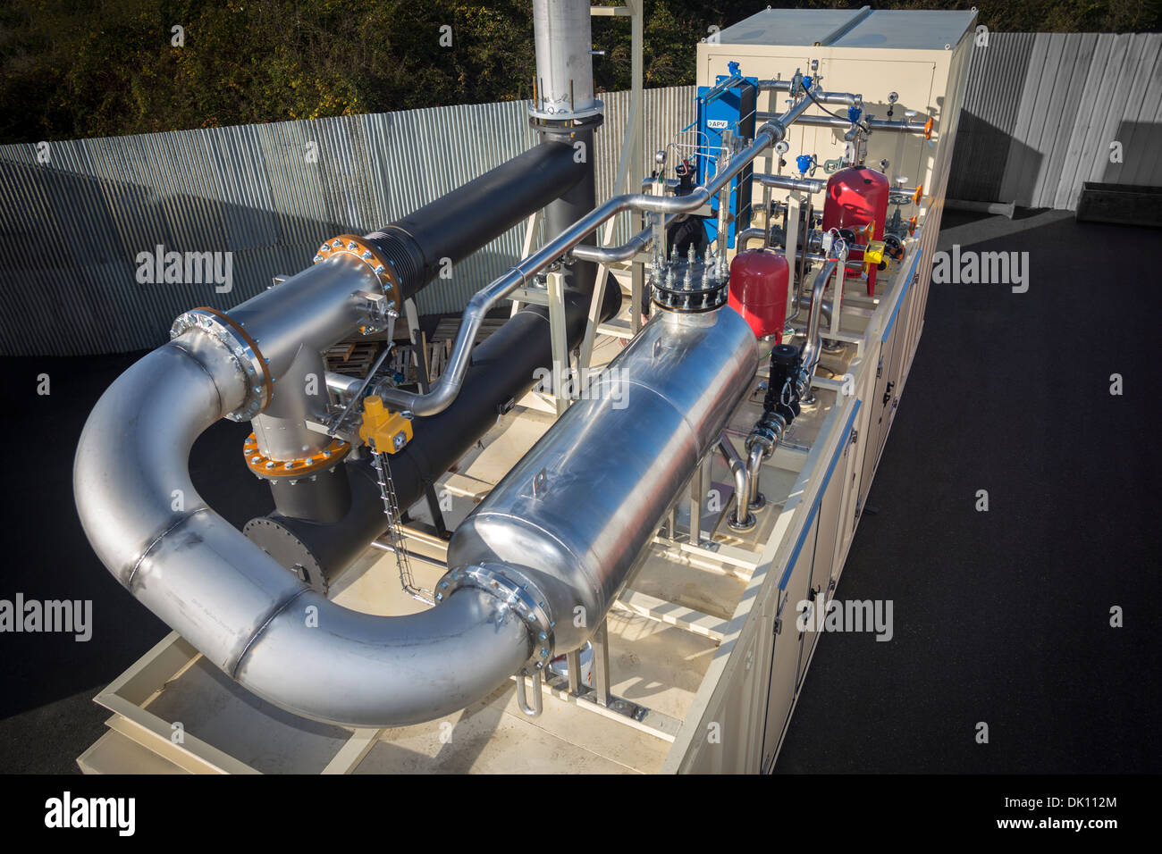 A containerized power station allowing the biogas recovering by fermentation of rubbish dump. Bio gas engine and cogeneration. Stock Photo