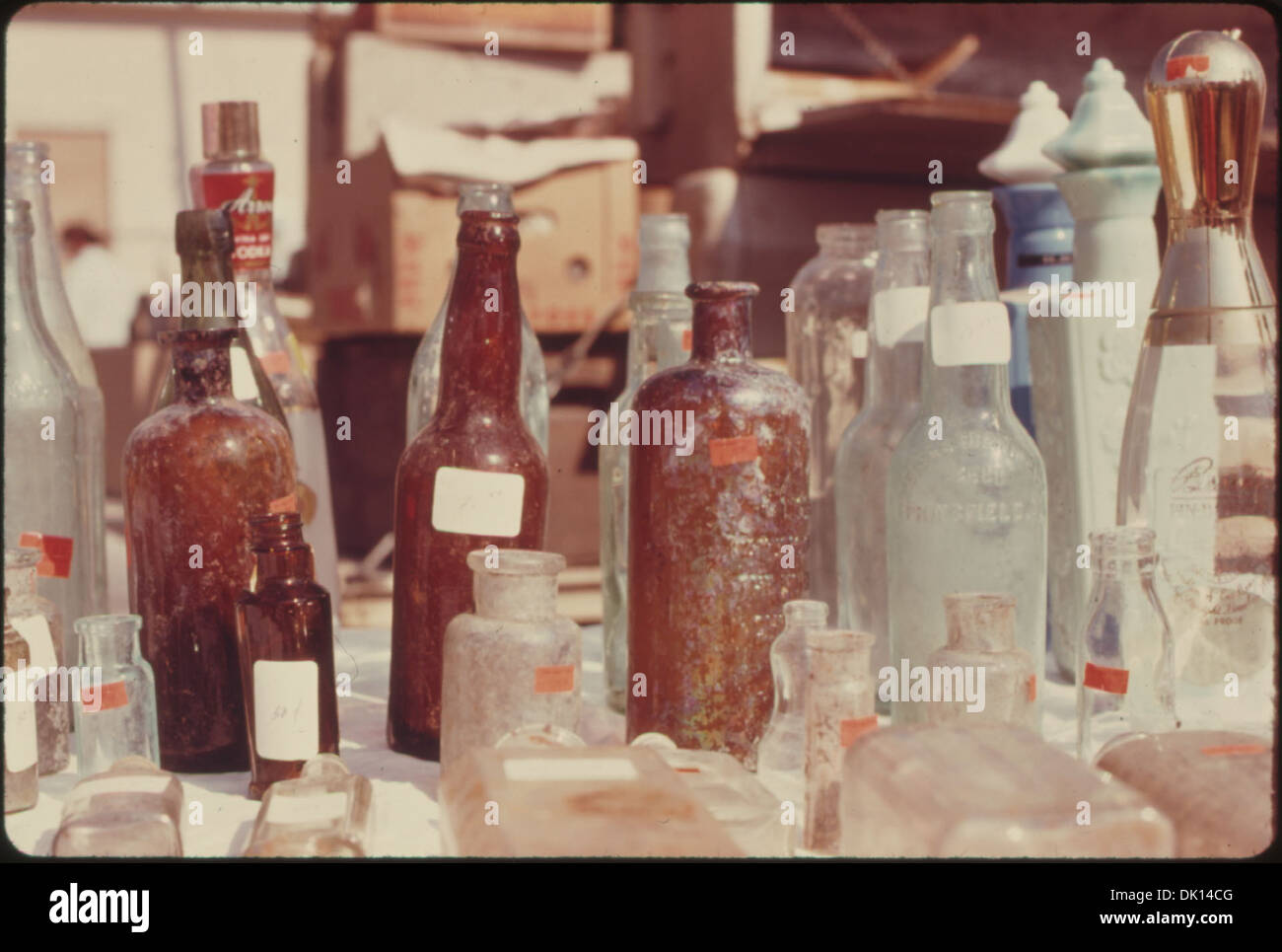 Old bottles for sale at flea market in white cloud hires stock photography and images Alamy