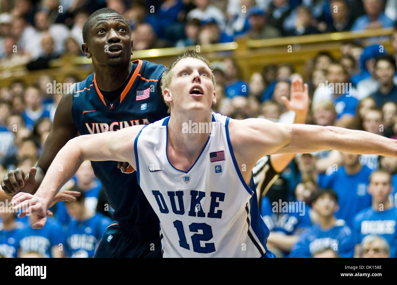 Jan. 15, 2011 - Durham, North Carolina, U.S - Duke Blue Devils forward Kyle Singler (12) blocks out Virginia Cavaliers center Assane Sene (5) .Duke beats Virginia 76-60 at Cameron Indoor Stadium (Credit Image: © Mark Abbott/Southcreek Global/ZUMAPRESS.com) Stock Photo