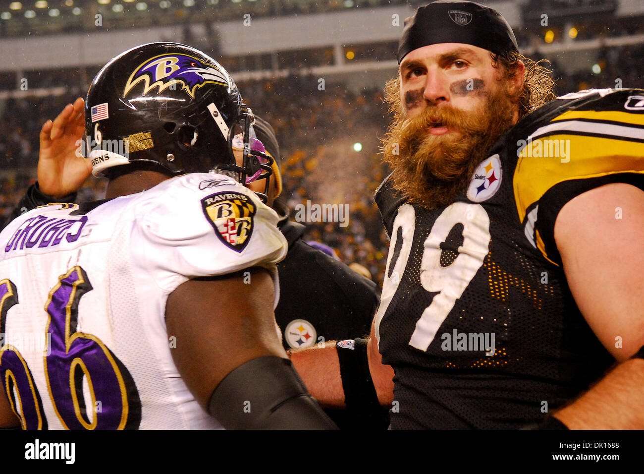 Jan. 15, 2011 - Pittsburgh, PENNSYLVANNIA, U.S - Baltimore Ravens guard Ben Grubbs (66) and Pittsburgh Steelers defensive end Brett Keisel (99) meet on the field after the Steelers and Ravens AFC playoff game at Heinz Field in Pittsburgh, PA...Steelers beat the Ravens by a score of  31-24 (Credit Image: © Dean Beattie/Southcreek Global/ZUMAPRESS.com) Stock Photo