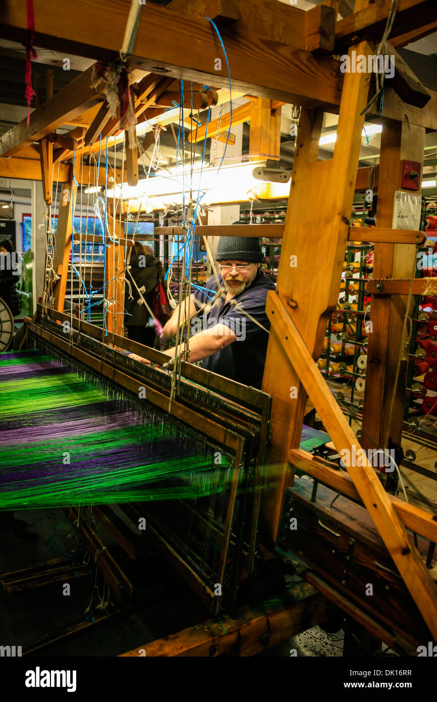 Demonstration of the old weaving process to make textiles used in the