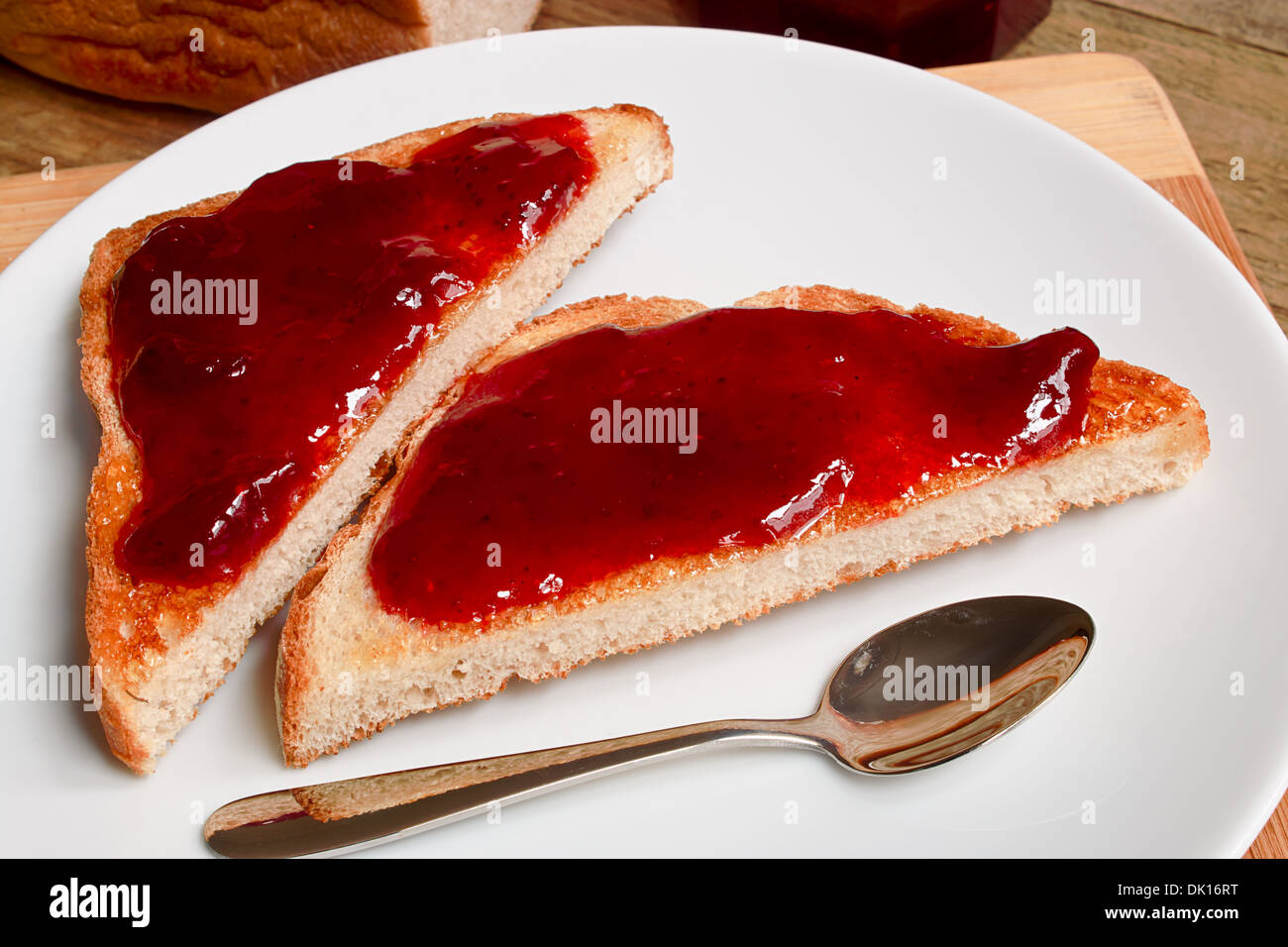 raspberry jam on toast Stock Photo Alamy