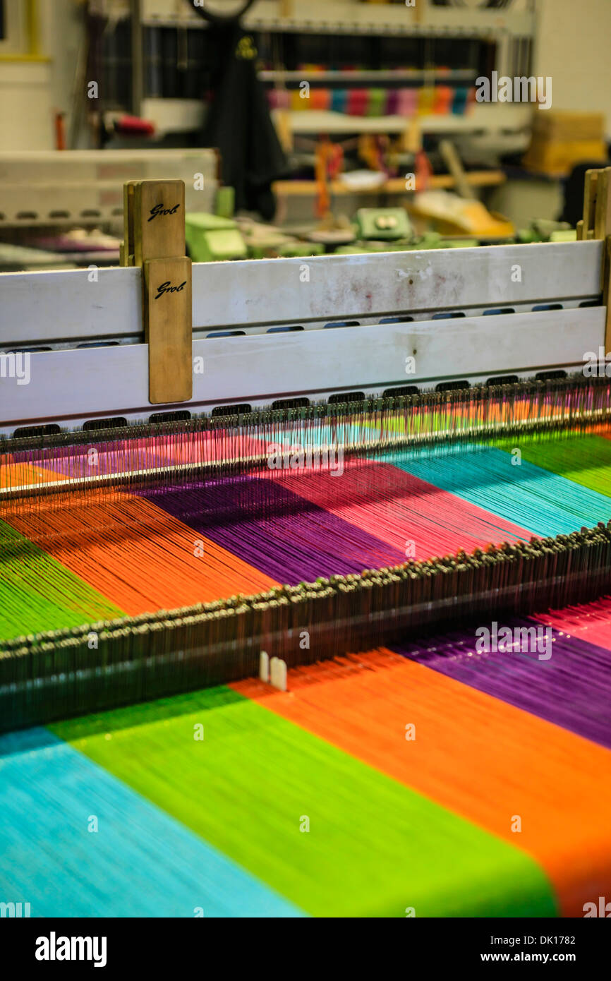 Modern weaving machine producing elaberate patterned textile for the