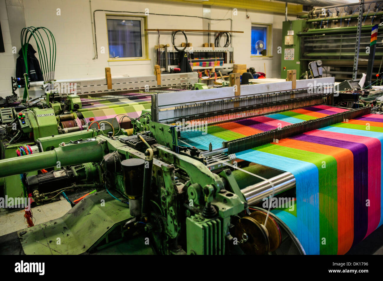 Modern weaving machine producing elaberate patterned textile for the