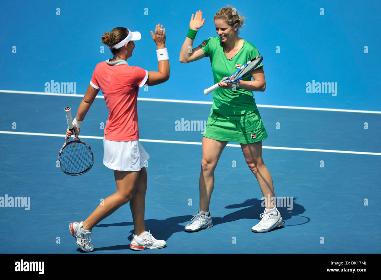 Jan. 16, 2011 - Melbourne, Victoria, Australia - Samantha Stosur and Kim Clijsters celebrate a point at the Rally For Relief charity exhibition match by top players of the 2011 Australian Open at Melbourne Park. (Credit Image: © Sydney Low/Southcreek Global/ZUMAPRESS.com) Stock Photo