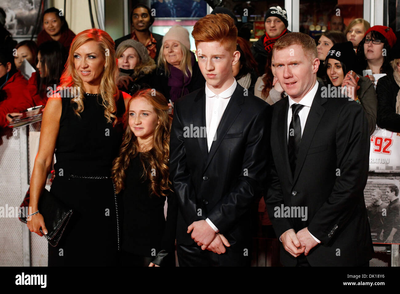 Former Manchester United and England soccer player Paul Scholes (R) and his wife Claire with their daughter Alicia and eldest so Stock Photo