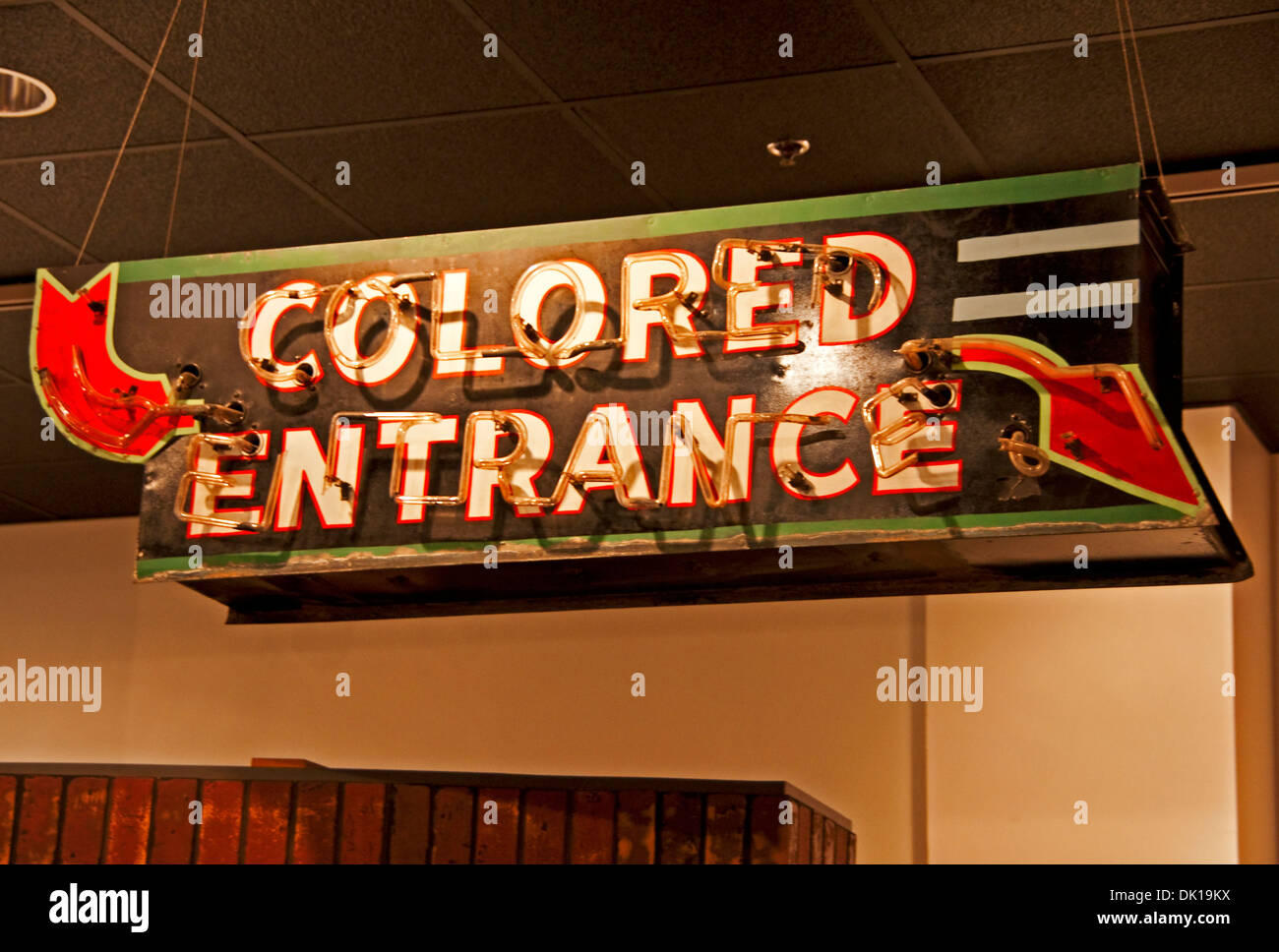 Racial segregation sign for Colored Entrance at History Museum of Mobile. Stock Photo