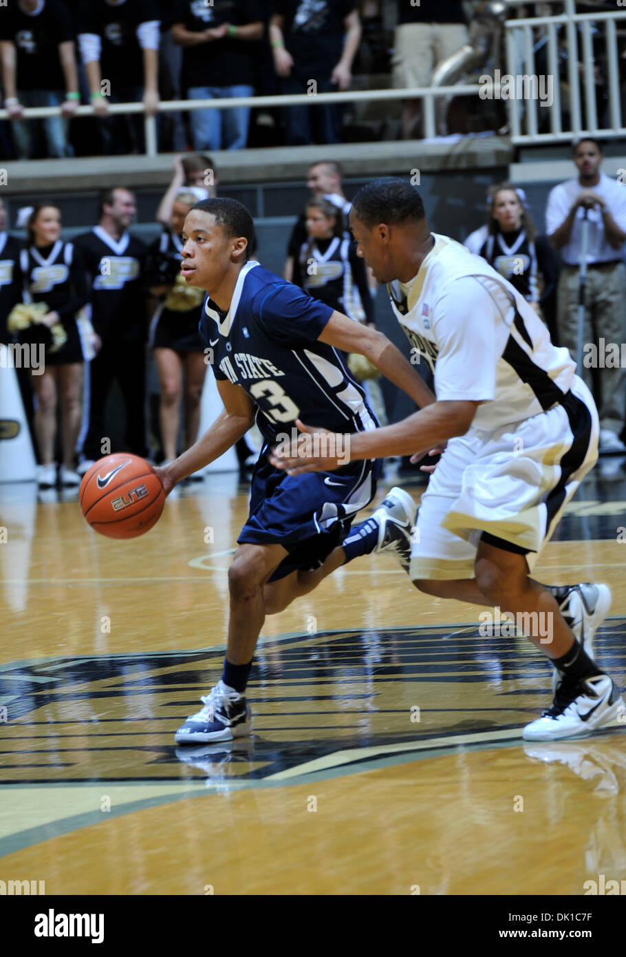 Jan. 20, 2011 - West Lafayette, Indiana, United States of America - Penn State's So G Tim Frazier (23) drives past Purdue's  Jr G John Hart (32) in the game between Penn State and Purdue at Mackey Arena in West Lafayette. Purdue won the game 63-62. (Credit Image: © Sandra Dukes/Southcreek Global/ZUMAPRESS.com) Stock Photo