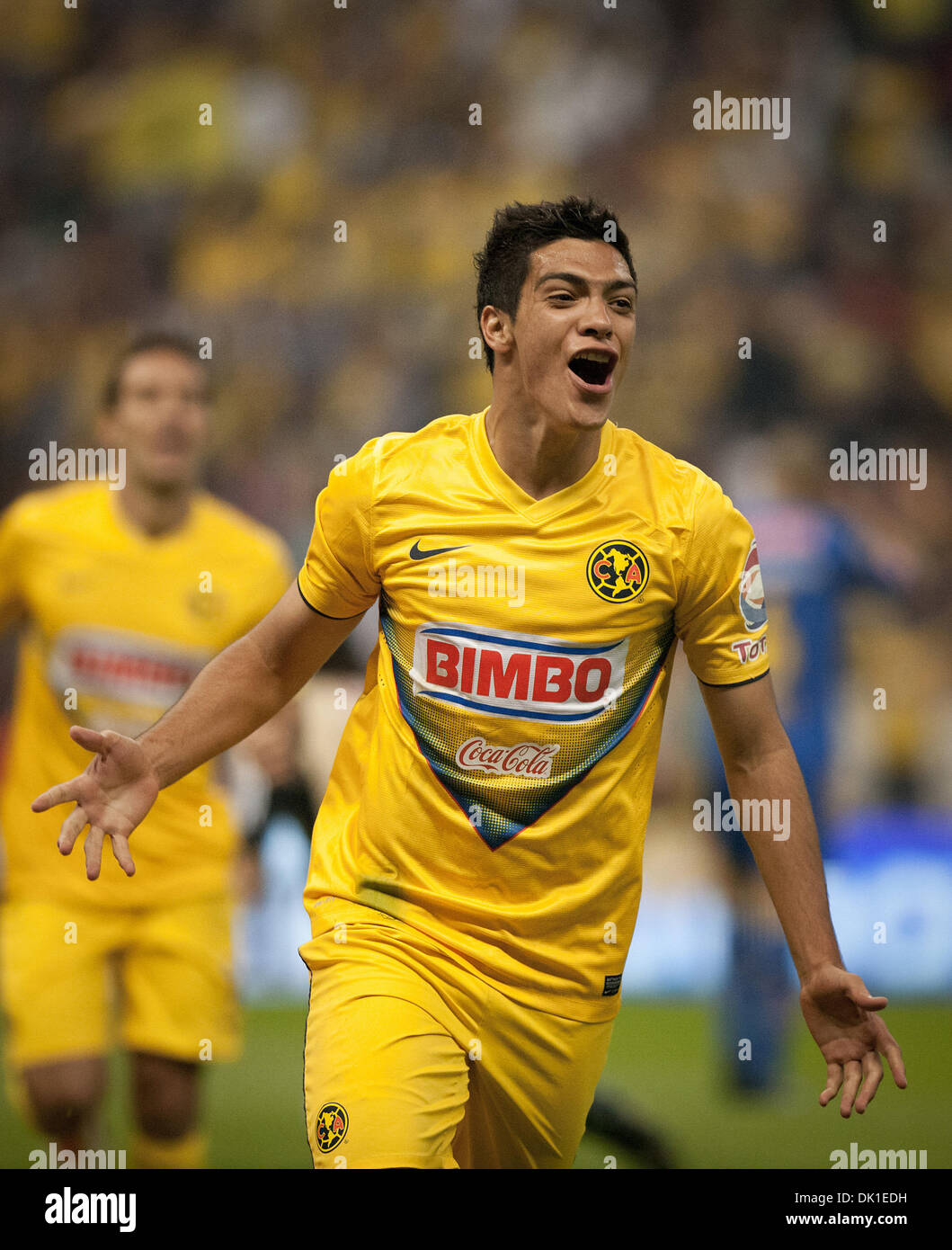 Mexico City, Mexico. 1st December 2013. America's Raul Jimenez celebrates after scoring during a match of the Liga MX against Tigres, held in the Azteca Stadium in Mexico City, capital of Mexico, on Dec. 1, 2013. (Xinhua/Pedro Mera/Alamy Live News) Stock Photo
