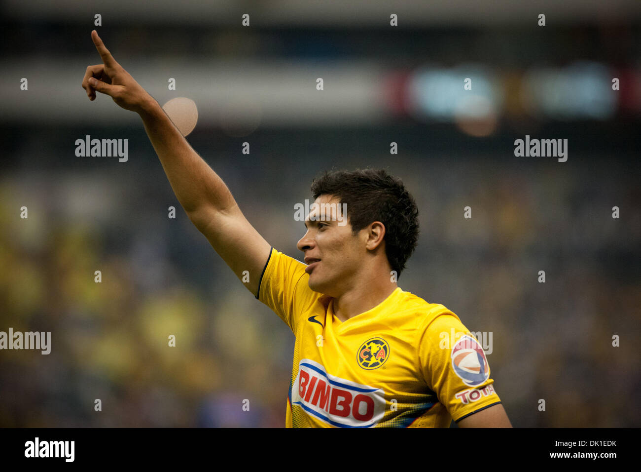 Mexico City, Mexico. 1st December 2013. America's Raul Jimenez celebrates after scoring during a match of the Liga MX against Tigres, held in the Azteca Stadium in Mexico City, capital of Mexico, on Dec. 1, 2013. (Xinhua/Pedro Mera/Alamy Live News) Stock Photo