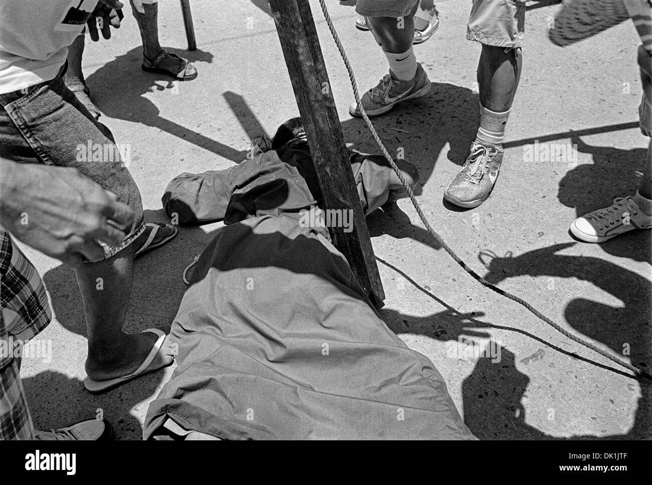 San Fernando; Pampanga; Philippines - March 29, 2013: Penitent fell after carrying a cross during penitential rites Stock Photo