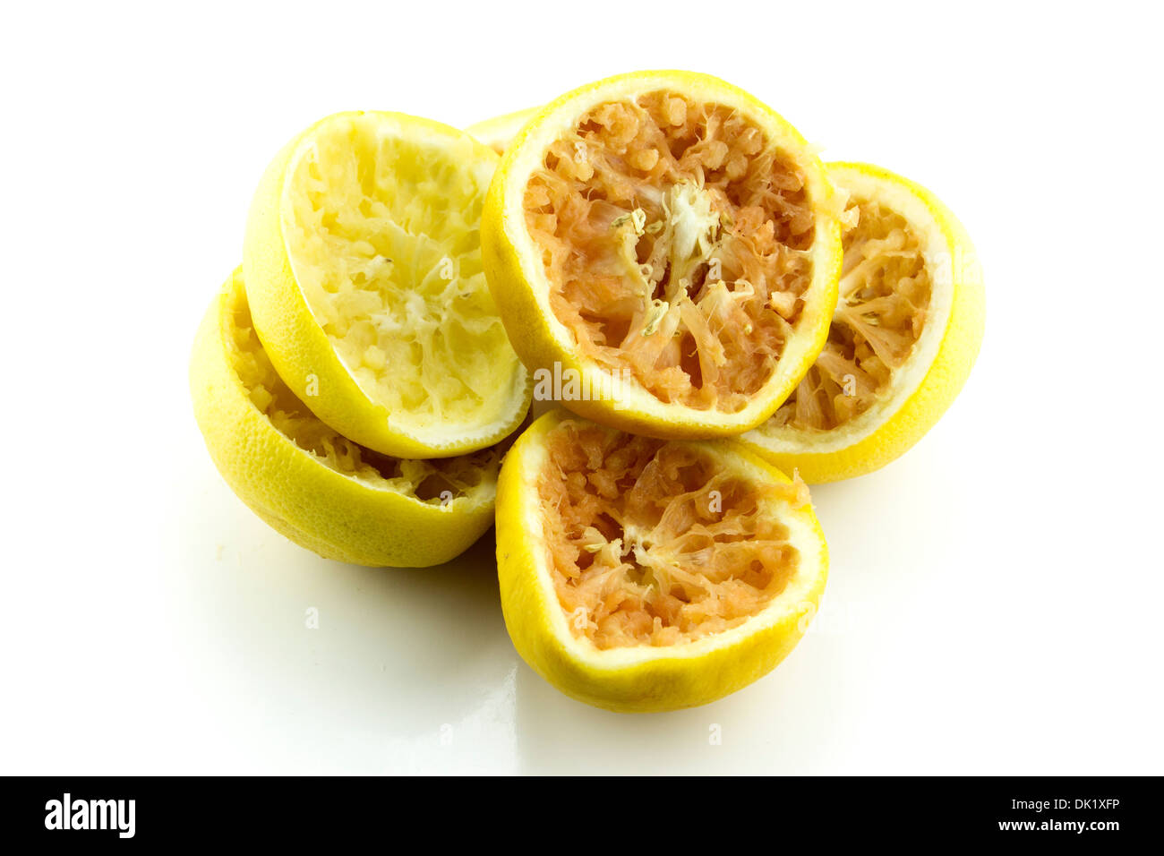 Squeezed Grapefruit on white background. Stock Photo