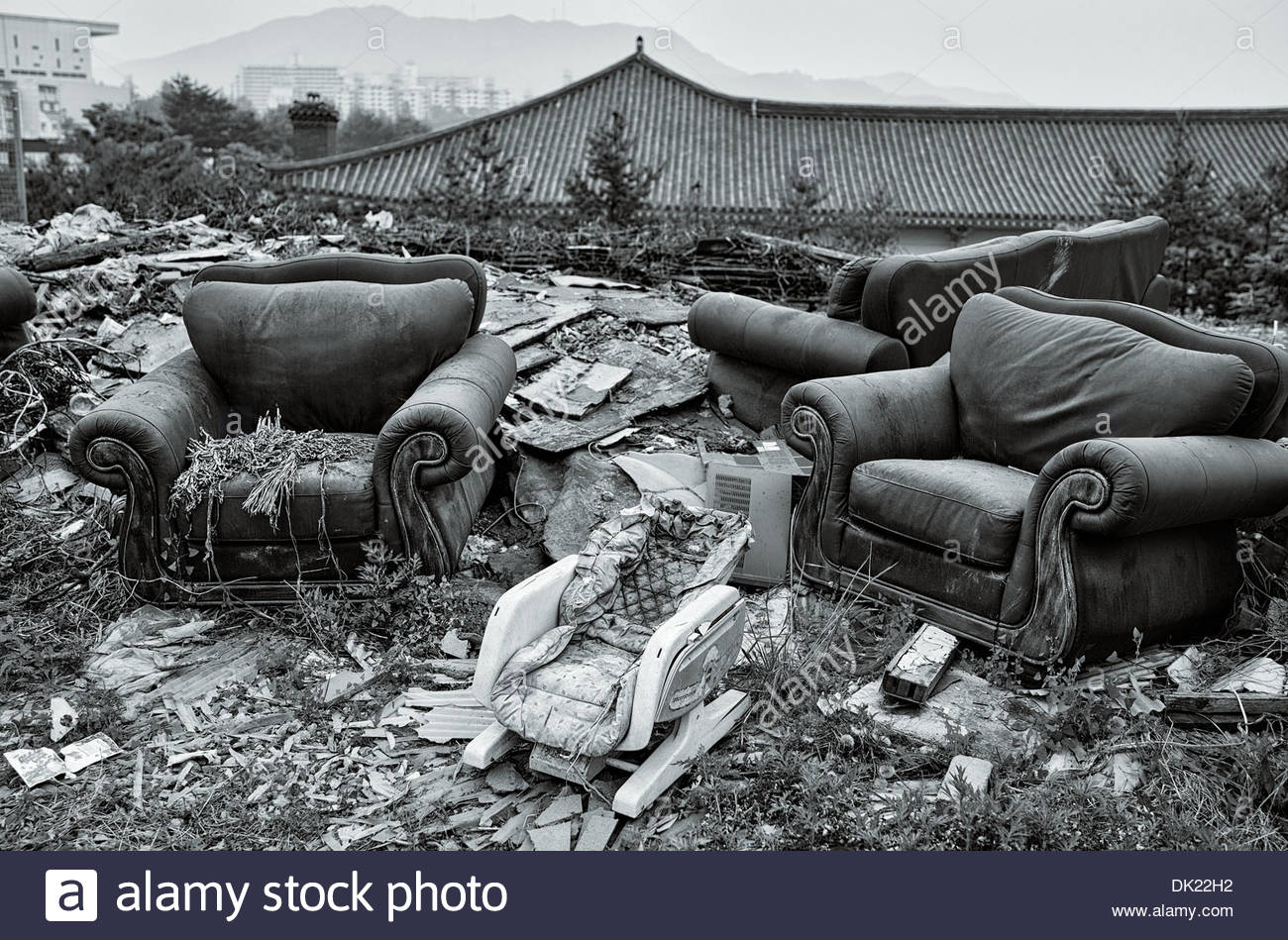 Expensive Leather Sofa Chairs Lie On A Rubbish Heap Located In