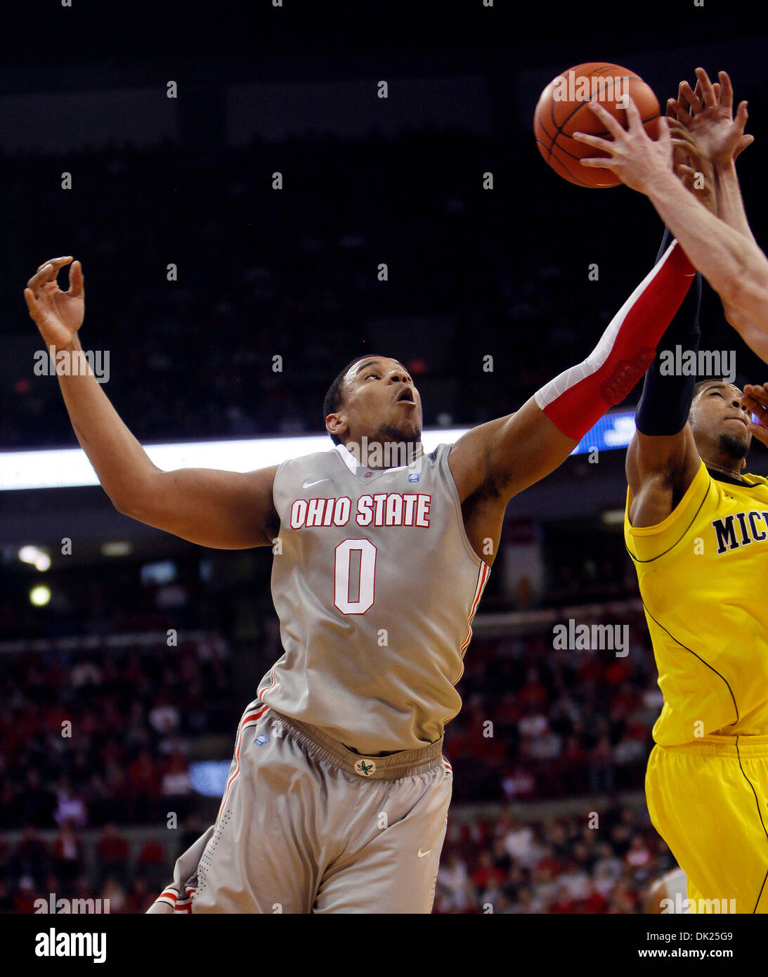 Feb 03, 2011 - Columbus, Ohio, U.S. - NCAA Basketball - Ohio State's JARED SULLINGER (0) grabs a rebound over Michigan's DARIUS MORRIS, right, during the first half of an NCAA college basketball game Thursday, Feb 3, 2011, in Columbus, Ohio. Ohio State won 62-53. (Photo/Terry Gilliam) (Credit Image: © Terry Gilliam/ZUMAPRESS.com) Stock Photo