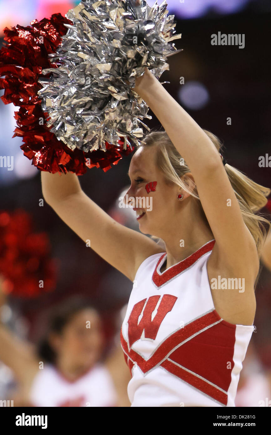 Feb. 6, 2011 - Madison, Wisconsin, U.S - Wisconsin cheerleader during a timeout entertains the crowd. In Big Ten action the Wisconsin Badgers defeated the Michigan State Spartans 82-56 at the Kohl Center in Madison, Wisconsin. (Credit Image: © John Fisher/Southcreek Global/ZUMAPRESS.com) Stock Photo
