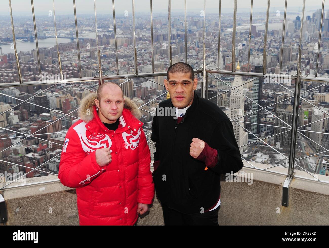 Feb. 9, 2011 - Manhattan, New York, U.S. - Strikeforce Mixed Martial Arts fighters FEDOR EMELIANENKO (L) also known as The Last Emperor and ANTONIO SILVA (R) also known as Bigfoot face off as they visit the Empire State Building's 86th floor observatory ahead of this Saturday's Strikeforce World Grand Prix at the Izod Center. (Credit Image: © Bryan Smith/ZUMAPRESS.com) Stock Photo