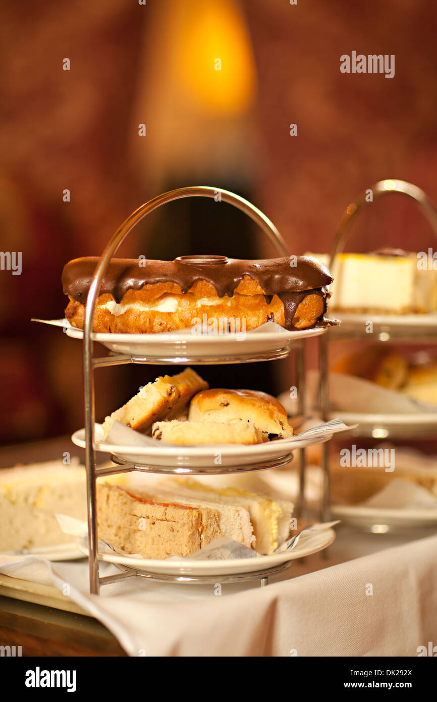 Close up of pastry desserts on cake tiers Stock Photo