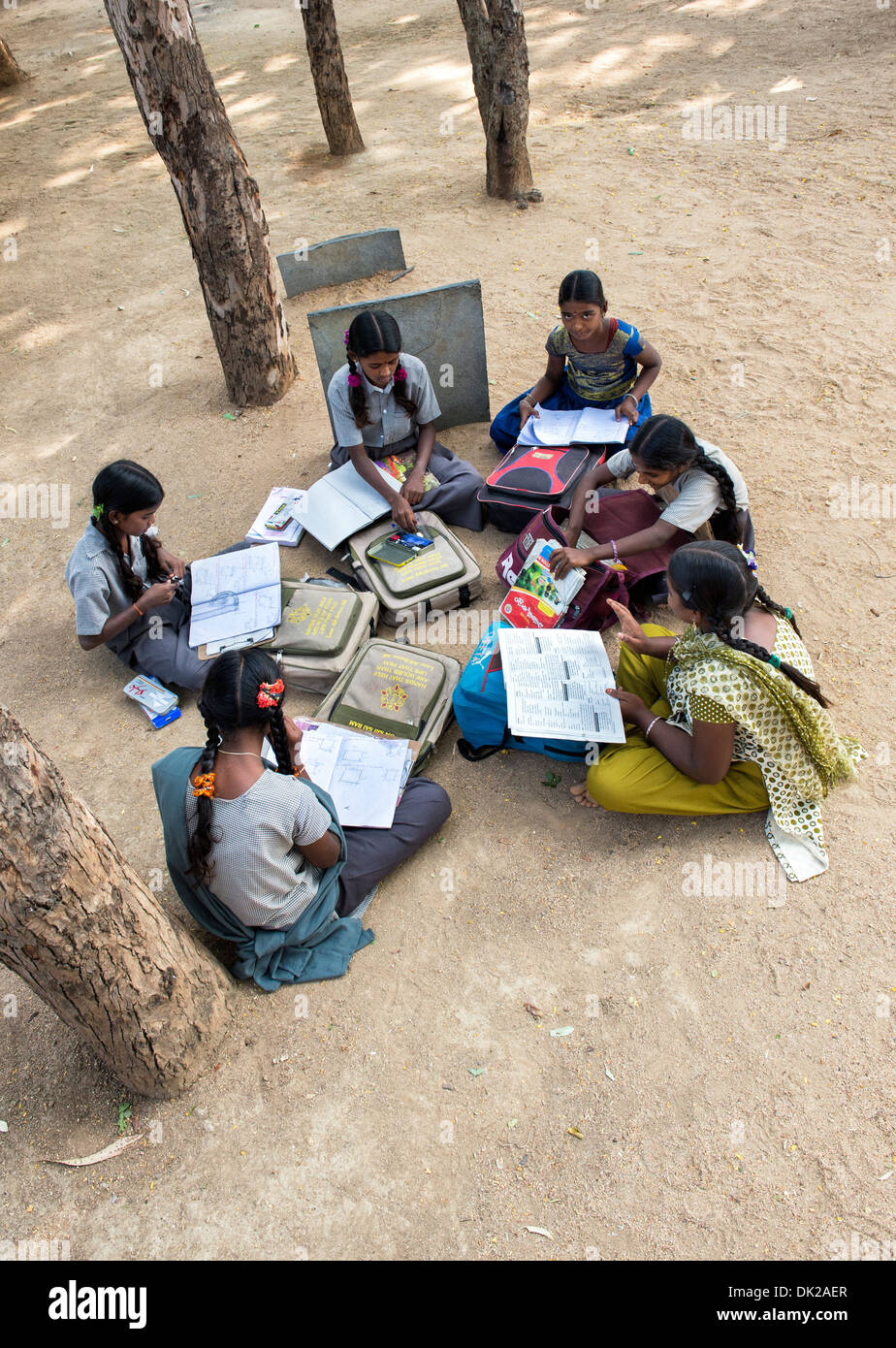 Rural Indian village school girls doing mathematics in an outside class. Andhra Pradesh, India Stock Photo