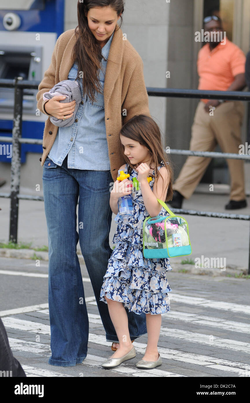 Katie Holmes and daughter Suri Cruise out and about in Manhattan Featuring: Katie Holmes and daughter Suri Cruise Where: New Stock Photo