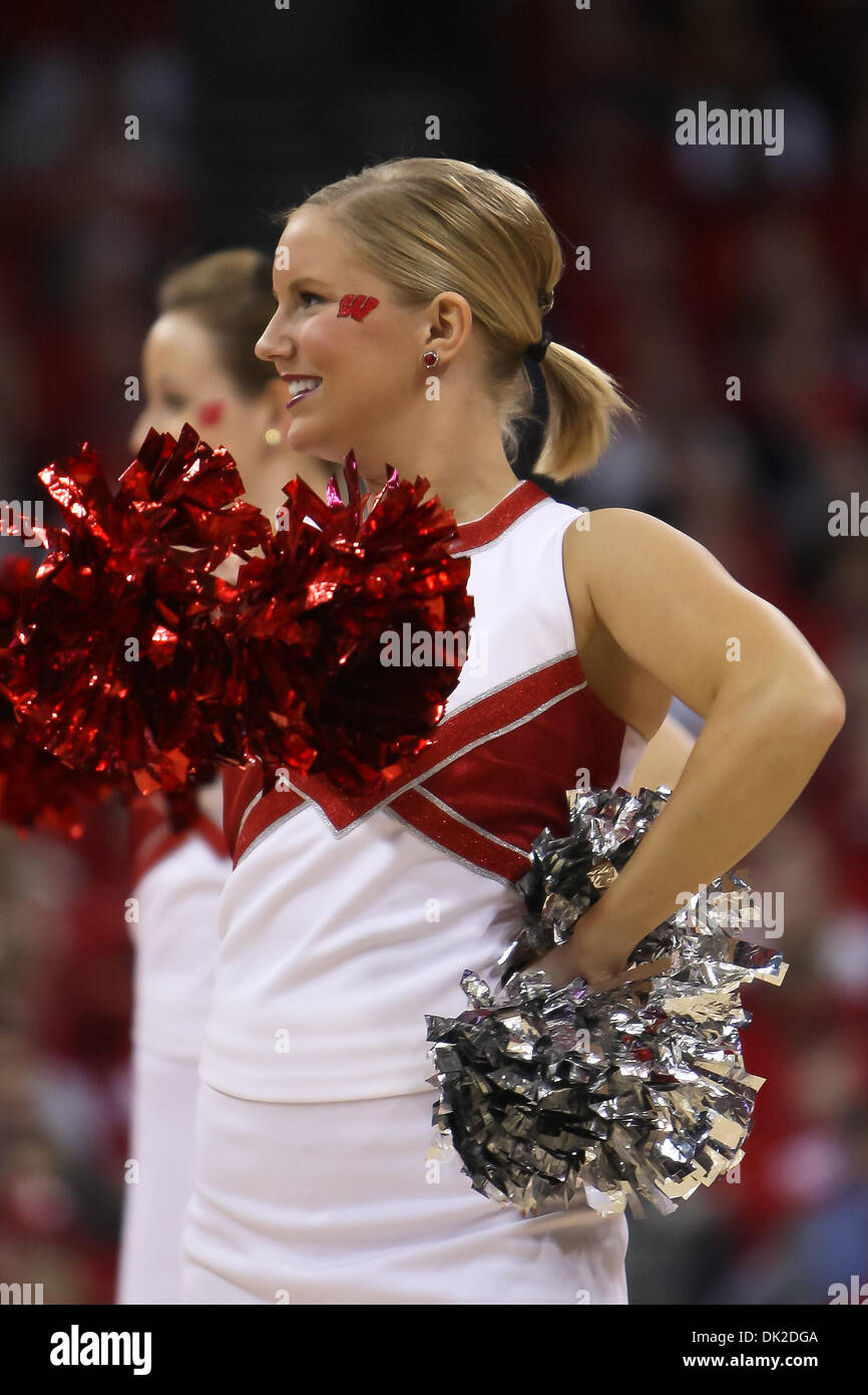 Feb. 12, 2011 - Madison, Wisconsin, U.S - Wisconsin cheerleader entertains the crowd during a timeout. The Wisconsin Badgers upset the Ohio State Buckeyes 71-67 at the Kohl Center in Madison, Wisconsin. (Credit Image: © John Fisher/Southcreek Global/ZUMAPRESS.com) Stock Photo
