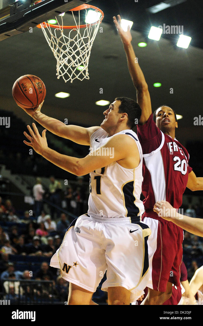 Feb. 12, 2011 - Annapolis, Maryland, U.S - Navy forward J.J. Avila (31) goes up for a shot under pressure from Lafayette forward Darion Benbow (20) during the first half of Saturday night's game at the Naval Academy in Annapolis, MD. Navy leads Lafayette 36-21 at the half. (Credit Image: © Russell Tracy/Southcreek Global/ZUMAPRESS.com) Stock Photo