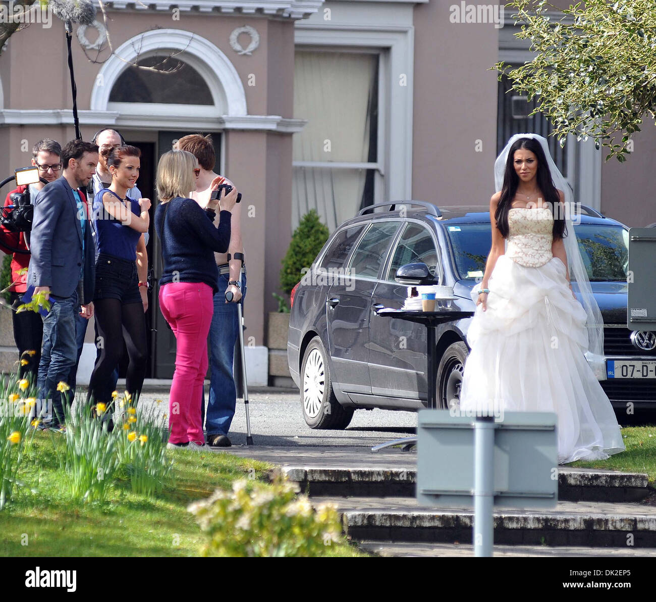 Georgia Salpa wears a wedding dress while filming a scene RTE's ...