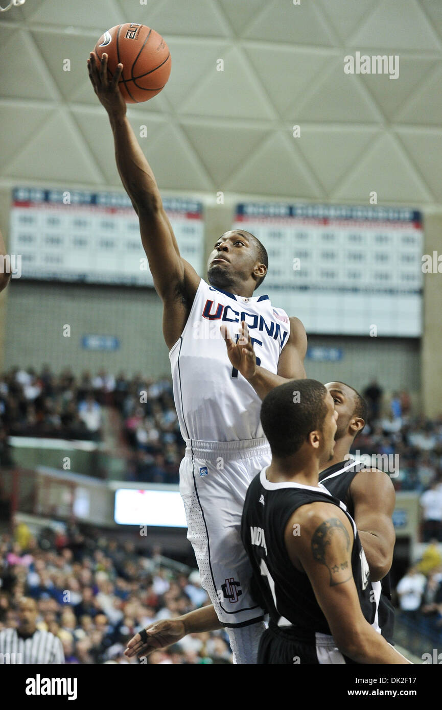 Feb. 13, 2011 - Storrs, Connecticut, United States of America - Connecticut G Kemba Walker (15) splits the Providence defenders while attempting a lay-up. Connecticut defeats Providence 75 - 57 at Gampel Pavilion. (Credit Image: © Geoff Bolte/Southcreek Global/ZUMAPRESS.com) Stock Photo