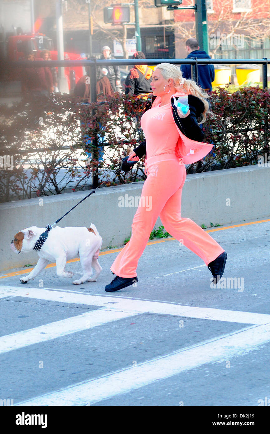 Coco Austin walking her dog Spartacus in Manhattan New York City, USA