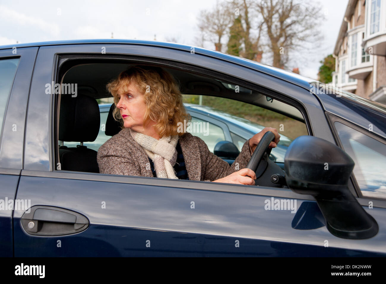 Woman reversing car hi-res stock photography and images - Alamy
