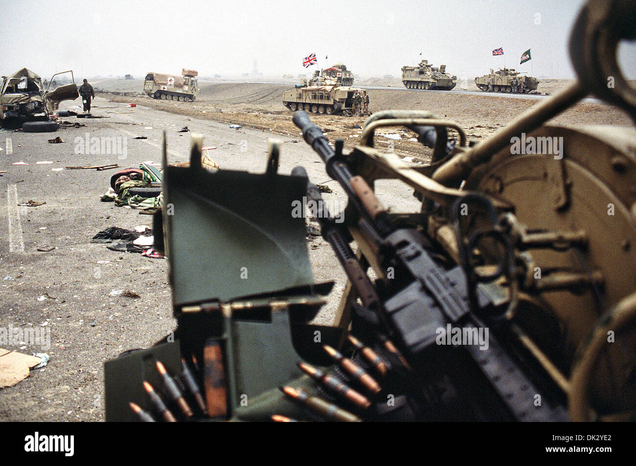 Destroyed vehicles along Kuwait Highway 8, the route fleeing Iraqi forces took as they retreated from Kuwait during Operation Desert Storm February 28, 1991 in Kuwait. The road is known as the 'highway of death' because of the number of vehicles destroyed by allied forces. Stock Photo