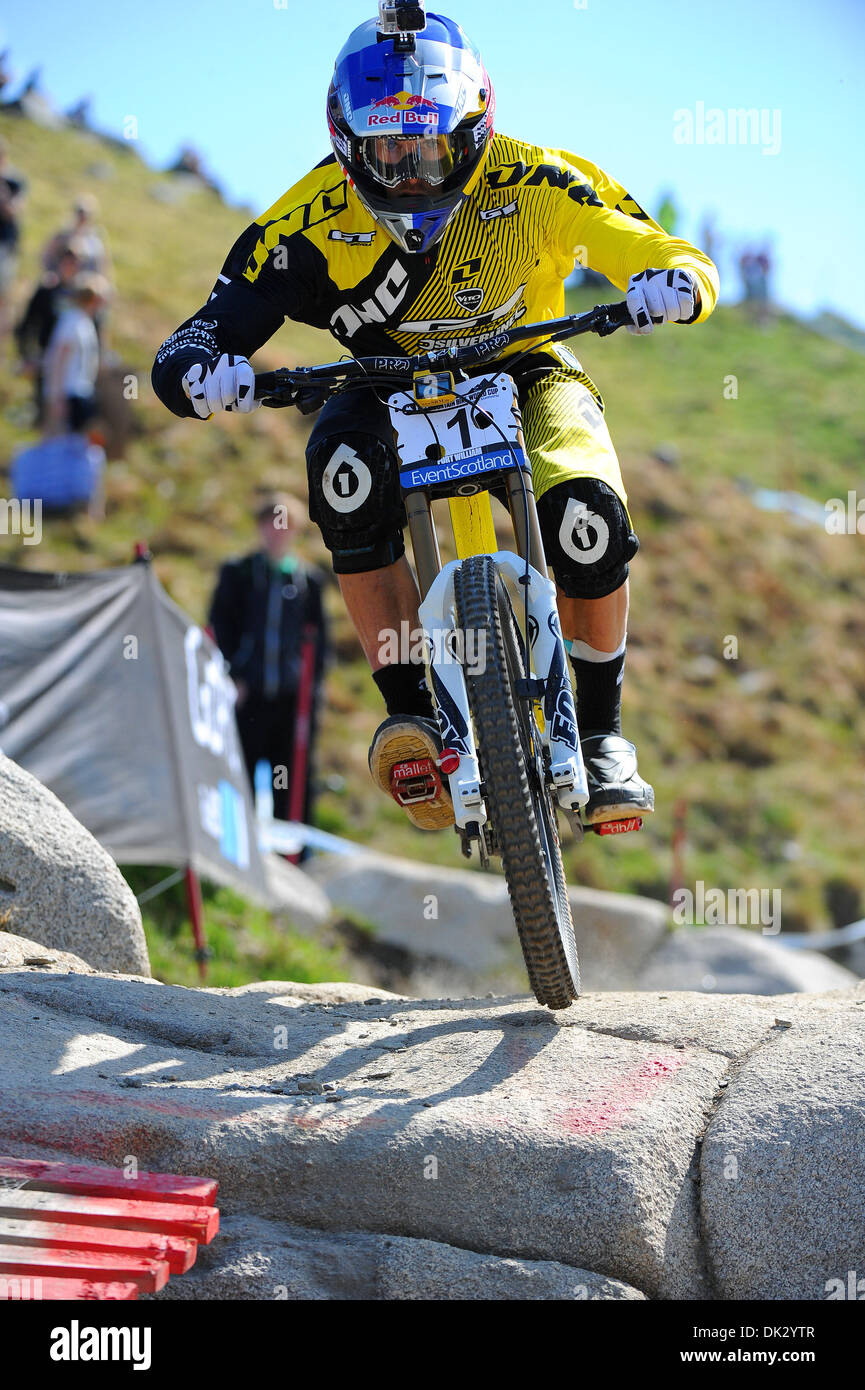 Downhill mountain bike racer Gee Atherton competes in the UCI Mountain Bike World Cup in Fort William, Scotland. Stock Photo