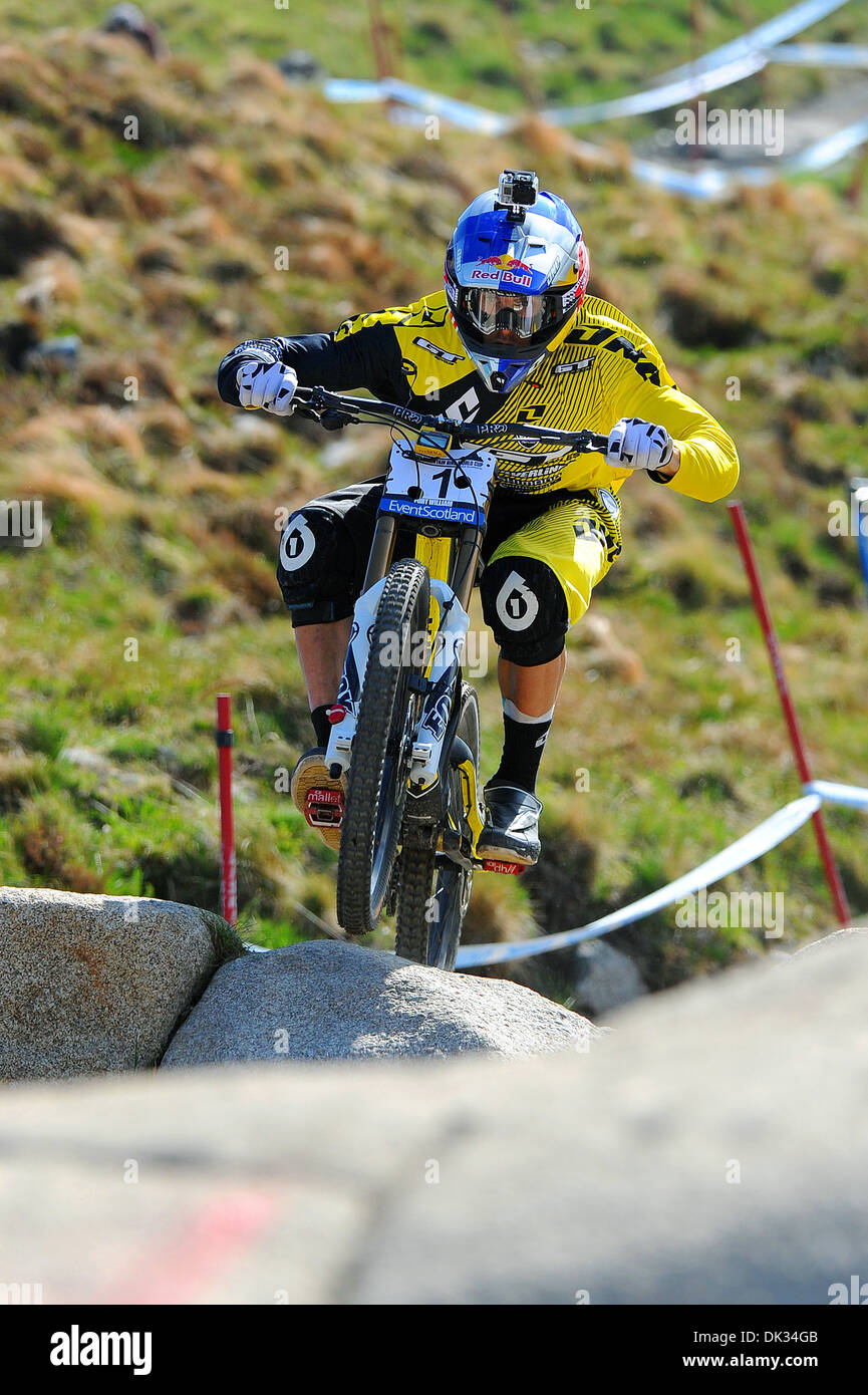 Downhill mountain bike racer Gee Atherton competes in the UCI Mountain Bike World Cup in Fort William, Scotland. Stock Photo
