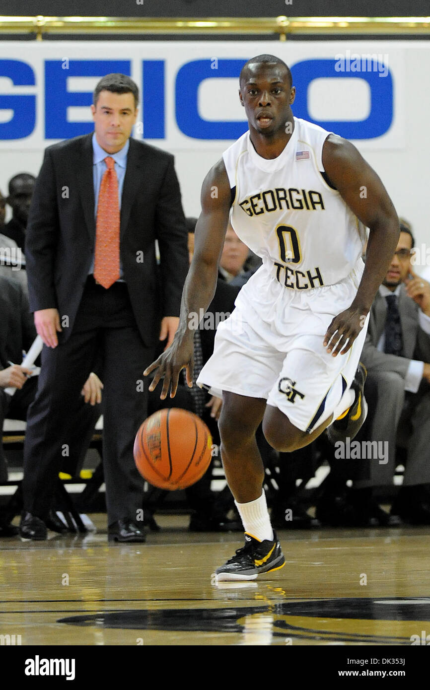 Feb. 23, 2011 - Atlanta, Georgia, United States of America - Georgia Tech guard Mfon Udofia (0) brings the ball down in a game against Virginia at Alexander Memorial Coliseum in Atlanta Georgia. Virginia wins 62-56 (Credit Image: © Marty Bingham/Southcreek Global/ZUMAPRESS.com) Stock Photo