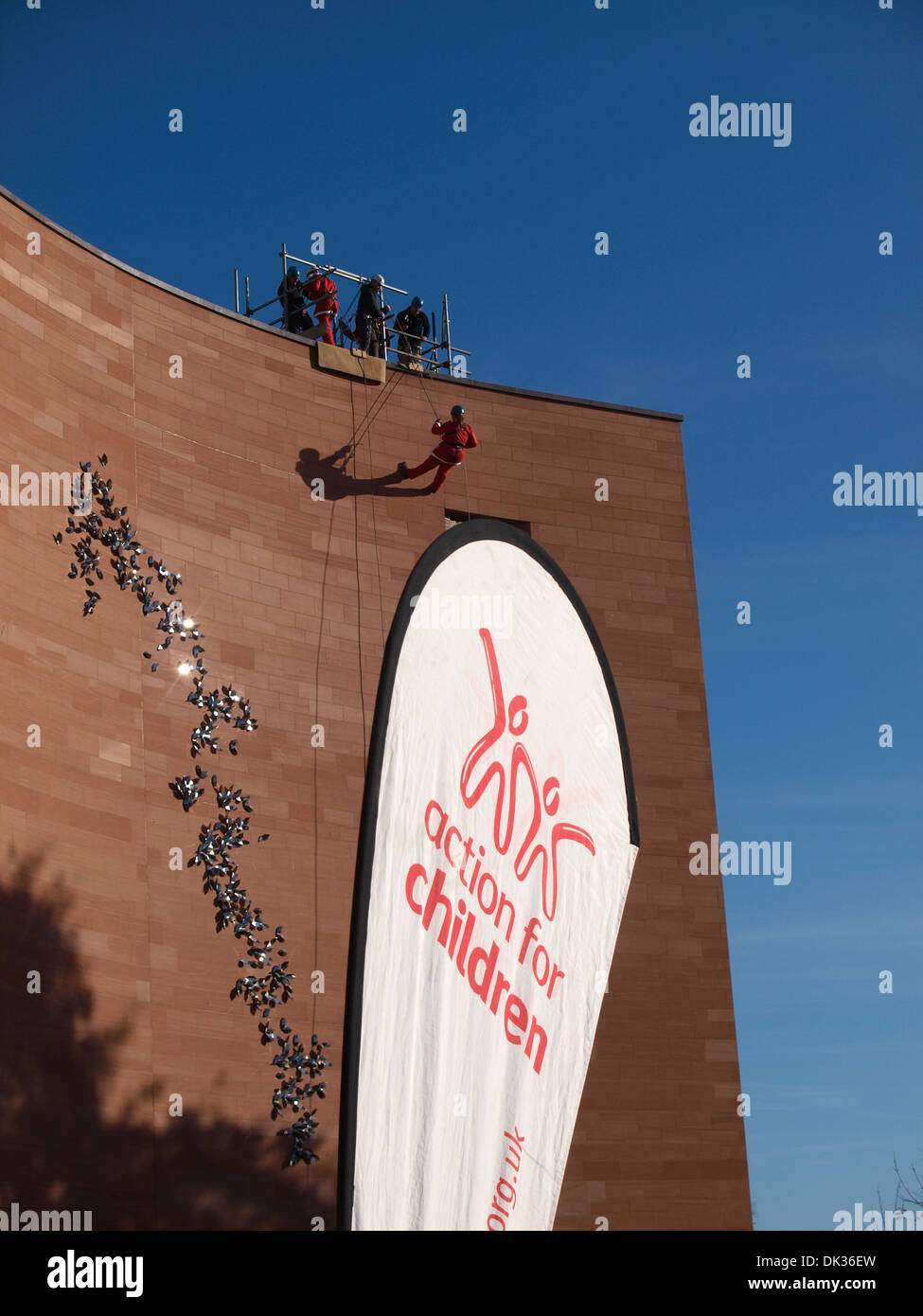 Action for children, Charity abseil down the Princesshay Shopping Centre in Exeter, Devon, UK Stock Photo