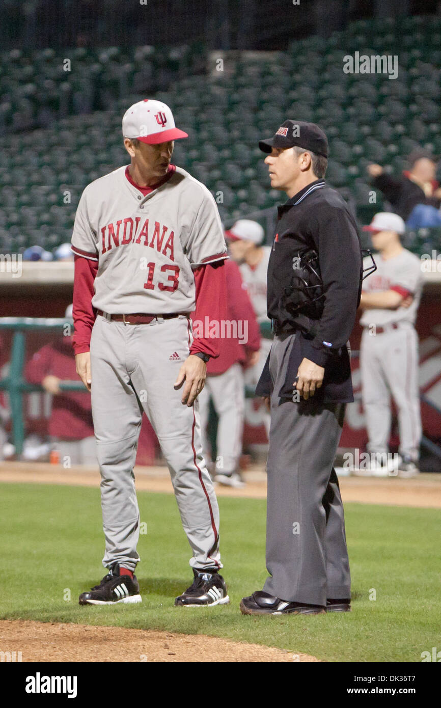 Feb. 25, 2011 - Corpus Christi, Texas, U.S - Indiana Hoosier Manager Tracy Smith argues a call with HP umpire Eric Thompson talking on a controversial home run call at the bottom of the third-inning during the 2011 Kleberg Bank College Classic at Corpus Christi home of the Double A Hooks. Indiana Hoosiers defeated Texas A&M Islanders 14-3. (Credit Image: © Juan DeLeon/Southcreek Gl Stock Photo