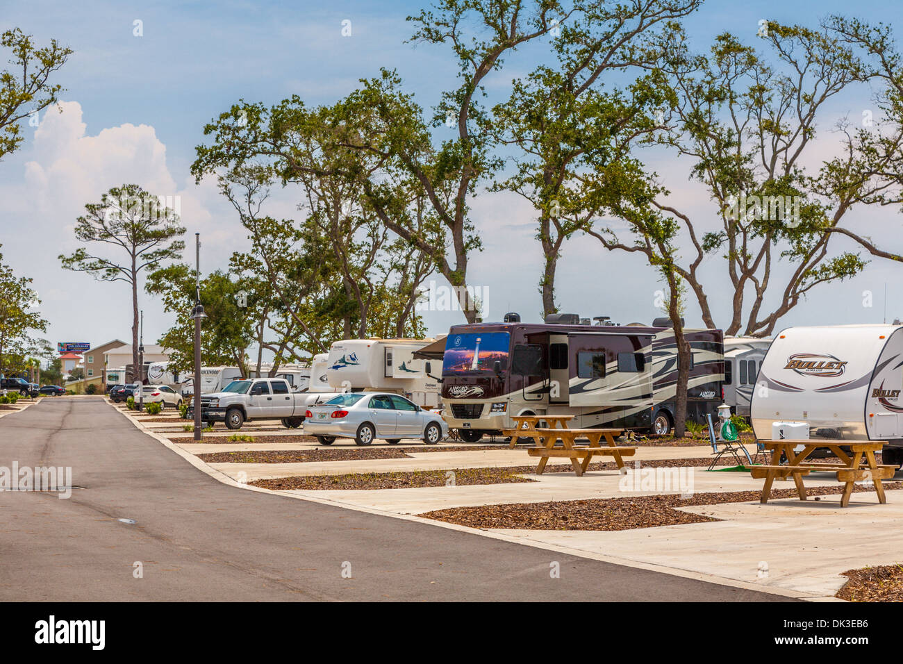 Motorhomes and travel trailers at St. Rosa RV Resort campground in