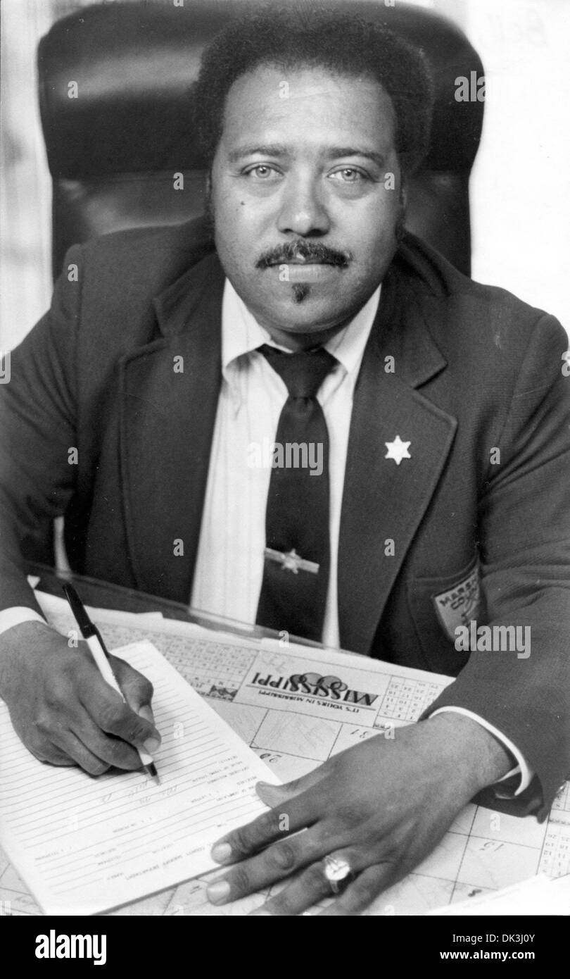 Mar. 5, 2011 - Marshall County, MS, U.S. - Osborne Bell, Marshall County, Mississippi Sheriff, in a 1984 photograph. Bell was shot and killed in the line of duty on May 7, 1986. Bell was Mississippi's first African-American coroner in Marshall County before being elected sheriff in 1979. Bart Mease was charged with capital murder and sentenced to death, but the conviction was overt Stock Photo