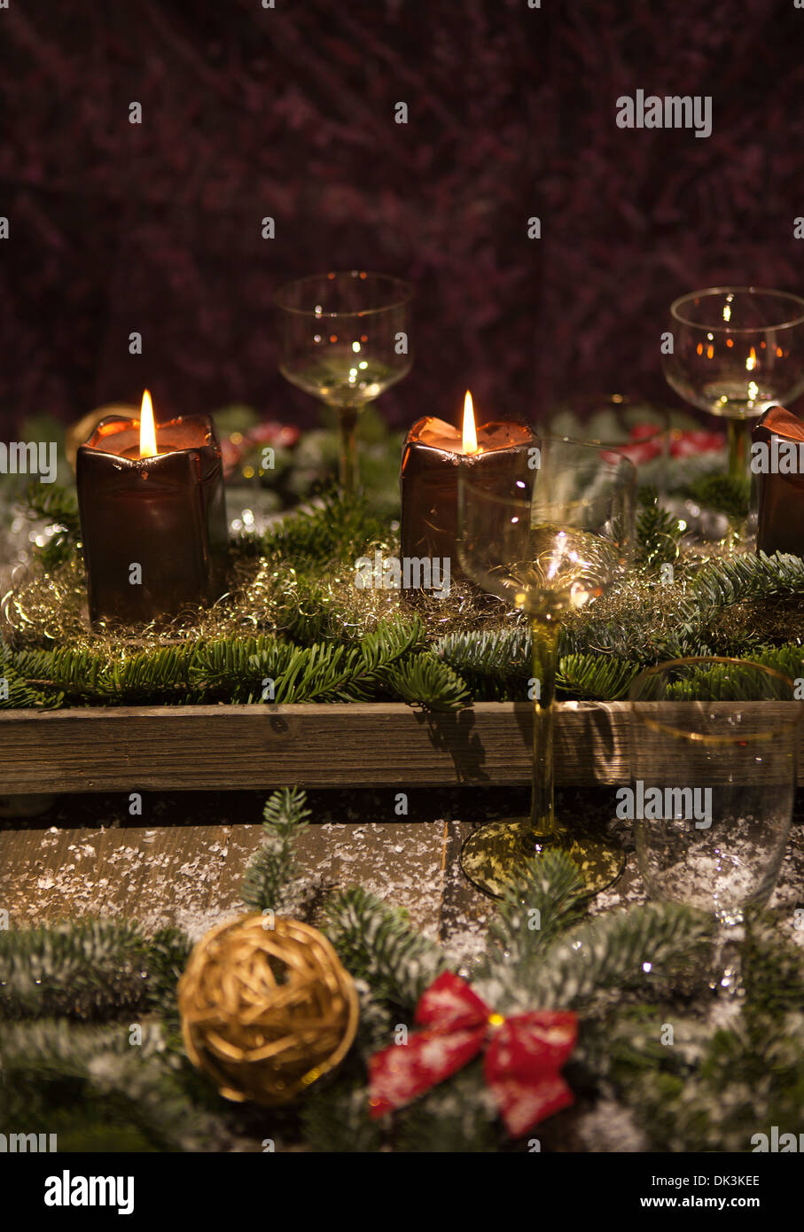 Wedding dinner table reception. Wedding table decoration - white branch  from a tree, crystal pendants, candles in glass spheres, on a white table  with Stock Photo - Alamy
