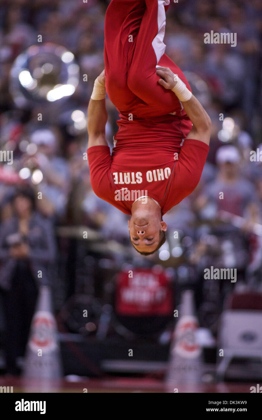 Mar. 6, 2011 - Columbus, Ohio, U.S.A - Ohio State Buckeyes cheerleader flips during a timeout during the game between #10 Wisconsin and #1 Ohio State at Value City Arena, Columbus, Ohio.  Ohio State defeated Wisconsin 93-65. (Credit Image: © Scott Stuart/Southcreek Global/ZUMAPRESS.com) Stock Photo