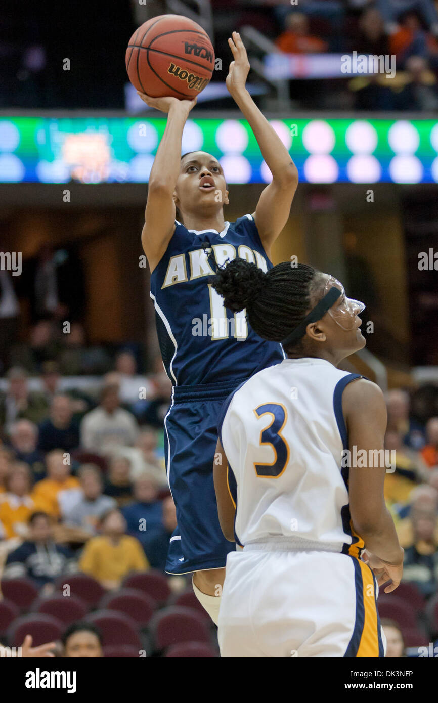 Mar. 9, 2011 - Cleveland, Ohio, U.S - Akron guard Natasha Williams (11) puts up a jump shot over Toledo forward Lecretia Smith (3) during the first half.  The Toledo Rockets defeated the Akron Zips 73-65 in the quarterfinals of the MAC WomenÃ•s Tournament at Quicken Loans Arena. (Credit Image: © Frank Jansky/Southcreek Global/ZUMAPRESS.com) Stock Photo
