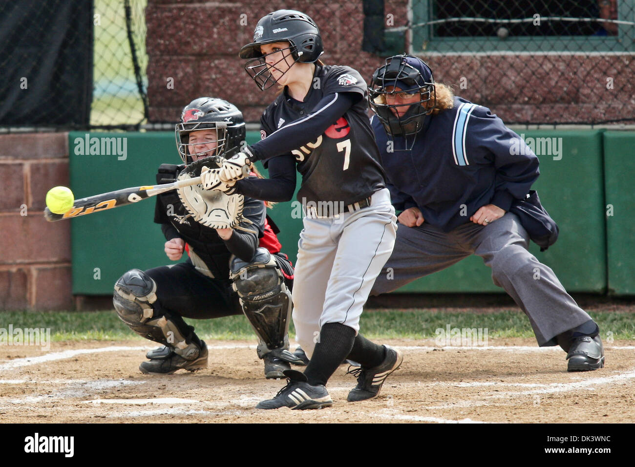 Mar. 12, 2011 - Edwardsville, Illinois, U.S - SIUE infielder Chelsea Yankolovich (7) makes contact for a homerun in the bottom of the fourth inning during a game between Southern Illinois University Edwardsville (SIUE) and Southeast Missouri State University (SEMO) at Cougar Stadium on the campus of the Southern Illinois University Edwardsville in Edwardsville, Illinois.  SEMO defe Stock Photo