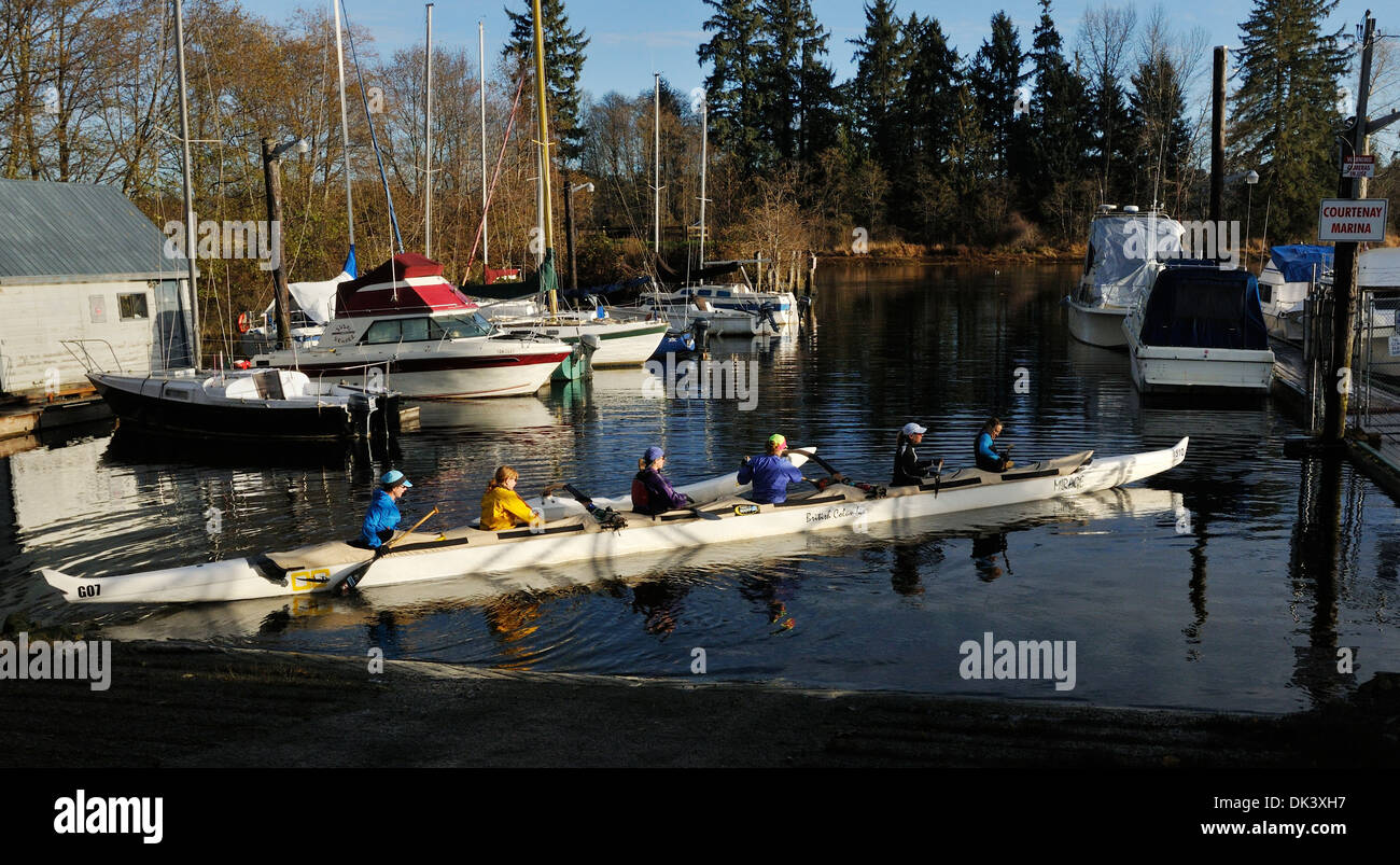 Six people set off for a paddle. Courtenay, Vancouver Island, British Columbia, Canada. Stock Photo